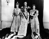 <p>One of the most memorable years of Queen Elizabeth's life was in 1953, as it's when she became monarch and took the throne—where she would remain for the next 70 years. Here, she poses in Buckingham Palace with her sister (center), mother (right), and husband <a href="https://www.townandcountrymag.com/society/tradition/g40691104/queen-elizabeth-coronation-photos/" rel="nofollow noopener" target="_blank" data-ylk="slk:following her coronation" class="link ">following her coronation</a>. </p>