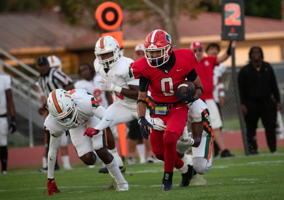 Virgil Maloy Jr of North Fort Myers runs the ball against Dunbar on Friday, Sept 1, 2023, in North Fort Myers.