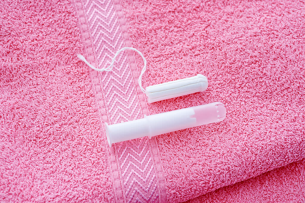 The controversial tampon tax will be split between 70 charities [Photo: Getty]