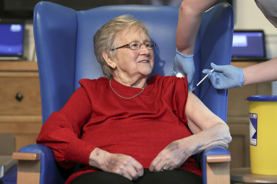 Resident Annie Innes, 90, receiving the Pfizer BioNTech COVID-19 vaccine at the Abercorn House Care Home in Hamilton, Scotland. Photo: Russell Cheyne/PA via AP