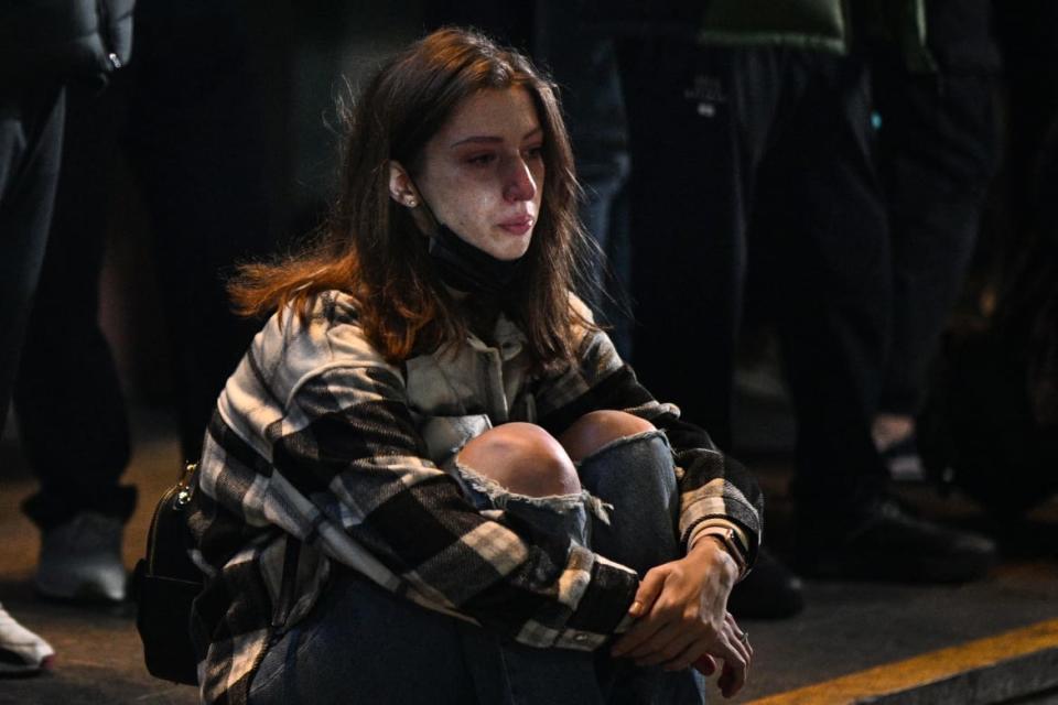 <div class="inline-image__caption"><p>A woman reacts outside the Itaewon subway station in the district of Itaewon in Seoul on October 30, 2022, the day after a Halloween stampede in the area. - More than 150 people were killed in a stampede at a Halloween event in central Seoul.</p></div> <div class="inline-image__credit">ANTHONY WALLACE/AFP via Getty Images</div>
