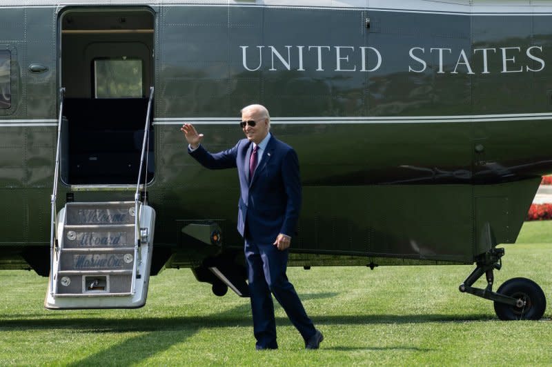 President Joe Biden walks on the South Lawn of the White House before boarding Maine One in Washington, D.C., on Friday. Photo by Nathan Howard/UPI