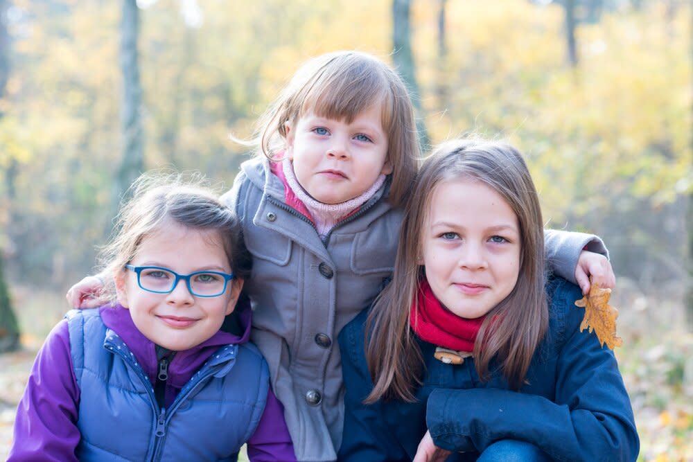 Three sisters outside