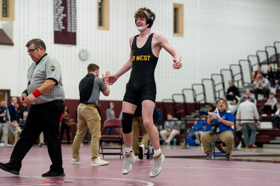 Central Bucks West's Patrick Kelly celebrates after winning the 139-pound title at Saturday's PIAA District One Class 3A Southeast Regional tournament.