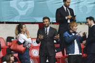 Former soccer player David Beckham, 2nd right and singer Ed Sheeran, 3rd left, wait for the start of the Euro 2020 soccer championship round of 16 match between England and Germany at Wembley Stadium in England, Tuesday June 29, 2021. (Justin Tallis, Pool Photo via AP)