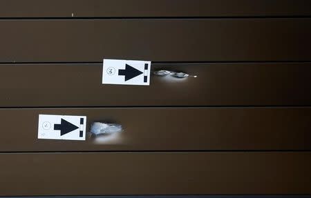 Impacts of bullets are seen inside Brussels central railway station after a suicide bomber was shot dead by troops in Brussels, Belgium, June 21, 2017. REUTERS/Francois Lenoir