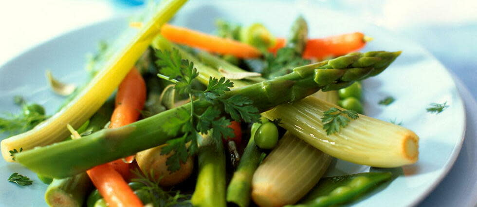 Une assiette de légumes et ça repart...  - Credit:J. HALL & L. MOUTON / AltoPress / PhotoAlto via AFP