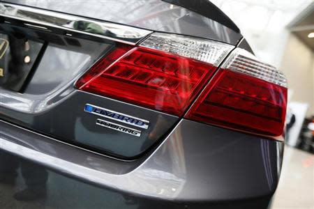 The 2014 Honda Accord Hybrid, which was named "Green Car of the Year", is pictured at the Los Angeles Auto Show in Los Angeles, California, November 21, 2013. REUTERS/Lucy Nicholson