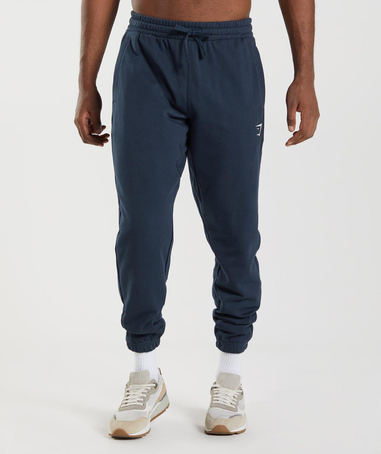 <p><a href="https://go.redirectingat.com?id=74968X1596630&url=https%3A%2F%2Fuk.gymshark.com%2Fproducts%2Fgymshark-essential-oversized-joggers-navy-aw22&sref=https%3A%2F%2F" rel="nofollow noopener" target="_blank" data-ylk="slk:Shop Now;elm:context_link;itc:0;sec:content-canvas" class="link rapid-noclick-resp">Shop Now</a></p><p>Essential Oversized Joggers</p><p>gymshark.com</p><p>£35.00</p>