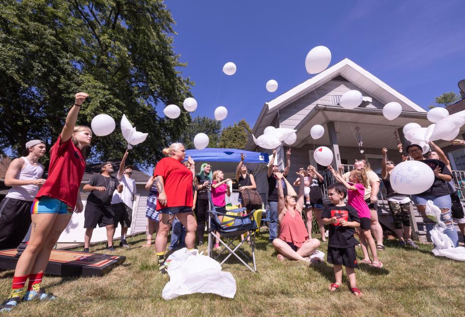 The family of Zachary Fornash, who was shot and killed by a Canton police officer in December, released balloons with personal messages on them for Fornash at a party held at his mother's Massillon home to celebrate his 25th birthday.