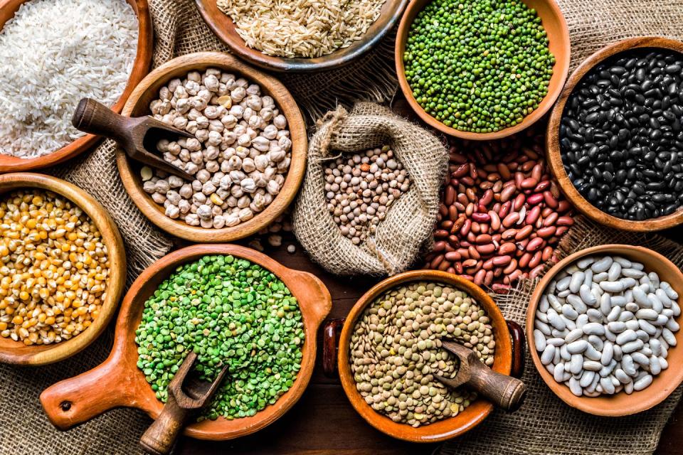 top view of leguminous seeds on rustic wood table