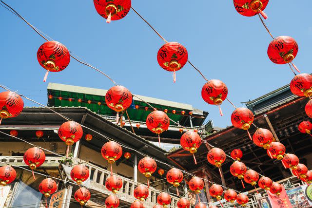 <p>Sean Marc Lee</p> Lanterns in front of the Shengping Theater, in the town of Jiufen.
