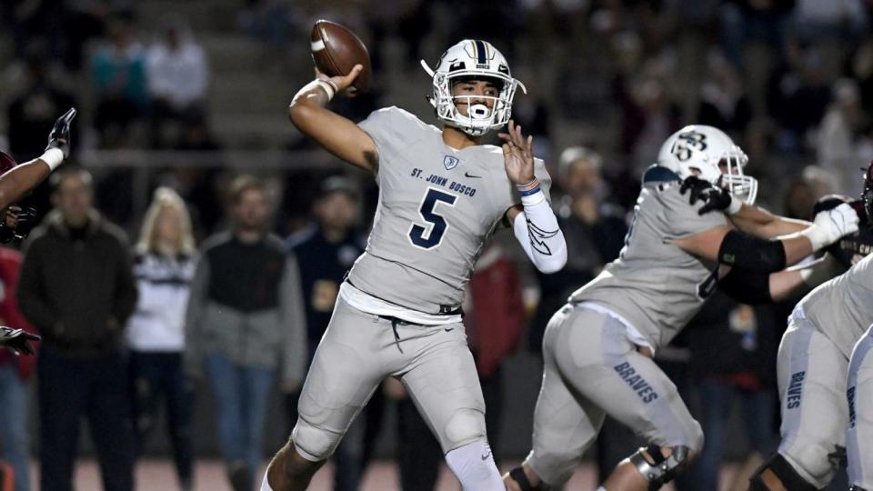 D.J. Uiagalelei passes during a high school playoff game.