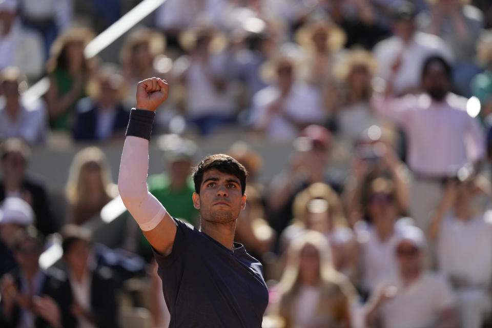 Spain's Carlos Alcaraz reacts during his semifinal match of the French Open tennis tournament against Italy's Jannik Sinner at the Roland Garros stadium in Paris, Friday, June 7, 2024. (AP Photo/Thibault Camus)