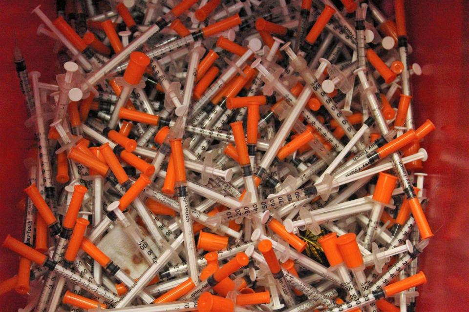 A large bin of used syringes at the Southern Colorado Harm Reduction Association's facility in Bessemer.