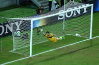 RECIFE, BRAZIL - JUNE 16: Iker Casillas of Spain is unable to stop Luis Suarez of Uruguay scoring his team's first goal from a free-kick during the FIFA Confederations Cup Brazil 2013 Group B match between Spain and Uruguay at the Arena Pernambuco on June 16, 2013 in Recife, Brazil. (Photo by Robert Cianflone/Getty Images)