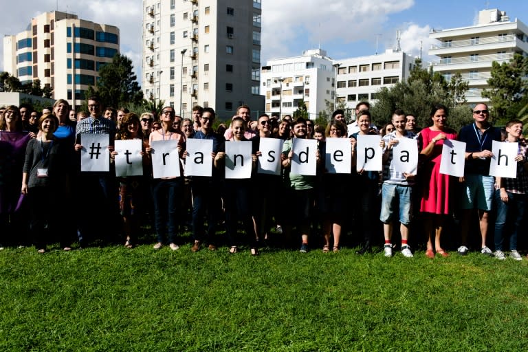 Activists pose for a picture following Europe's biggest annual conference on LGBTI (lesbian, gay, bisexual, transsexual and intersex) rights, to raise awareness and mark the International Day of Action for Trans Depathologization