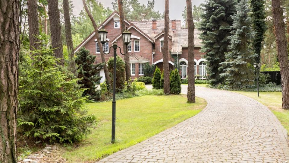 The long driveway doesn’t just provide privacy, it discourages visitors. - Credit: Adobe Stock