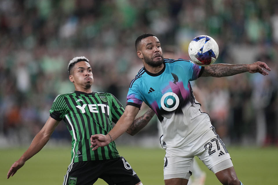 Minnesota United defender D.J. Taylor (27) works with the ball next to Austin FC midfielder Daniel Pereira (6) during the second half of an MLS soccer match Wednesday, May 31, 2023, in Austin, Texas. (AP Photo/Eric Gay)