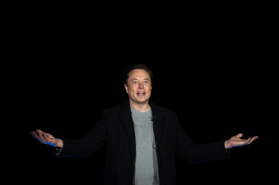 Elon Musk gestures as he speaks during a press conference at SpaceX's Starbase facility near Boca Chica Village in South Texas on February 10, 2022. - Billionaire entrepreneur Elon Musk delivered an eagerly-awaited update on SpaceX's Starship, a prototype rocket the company is developing for crewed interplanetary exploration. (Photo by JIM WATSON / AFP) (Photo by JIM WATSON/AFP via Getty Images)