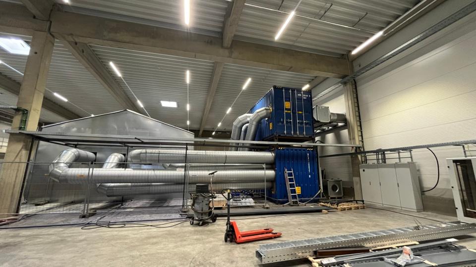 That silver shed on the left is where batteries are burned. All those pipes, which are huge in diameter, vent the exhaust through various cleaning methods. <em>Andrew P. Collins</em>