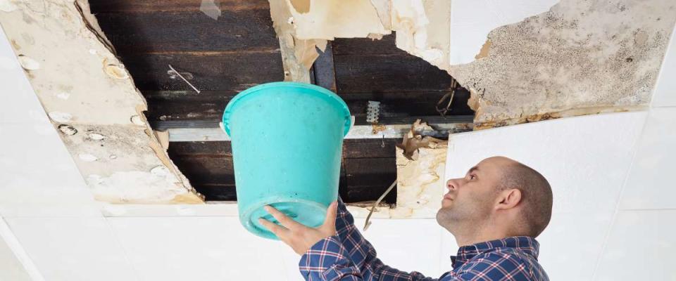 ceiling water damage bucket fixing leak