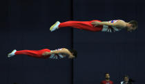 Gymnasts perform during the 23rd European trampoline championships in St. Petersburg, Russia.