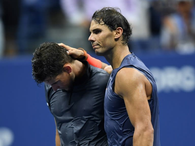 Best of mates: Rafael Nadal consoles Dominic Thiem