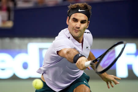 Tennis - Shanghai Masters tennis tournament - Shanghai, China - October 11, 2017 - Roger Federer of Switzerland in action against Diego Schwartzman of Argentina. REUTERS/Aly Song