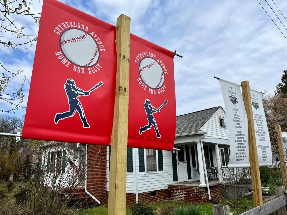 Some banners touting the old Pond Gap baseball field are displayed by Emma’s Kitchen off Sutherland Avenue on March 23, 2023. Some new signage honorarily renaming a section of the street here as Home Run Alley was recently approved by the Knoxville City Council.