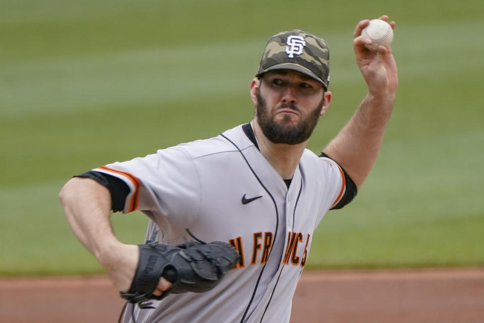 San Francisco Giants starter Alex Wood pitches against the Pittsburgh Pirates in the first inning of a baseball game, Sunday, May 16, 2021, in Pittsburgh. (AP Photo/Keith Srakocic)