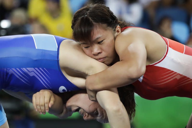 日本選手川井梨紗子對上俄羅斯的茵娜・特拉祖科娃（Inna Trazhukova）。（美聯社）