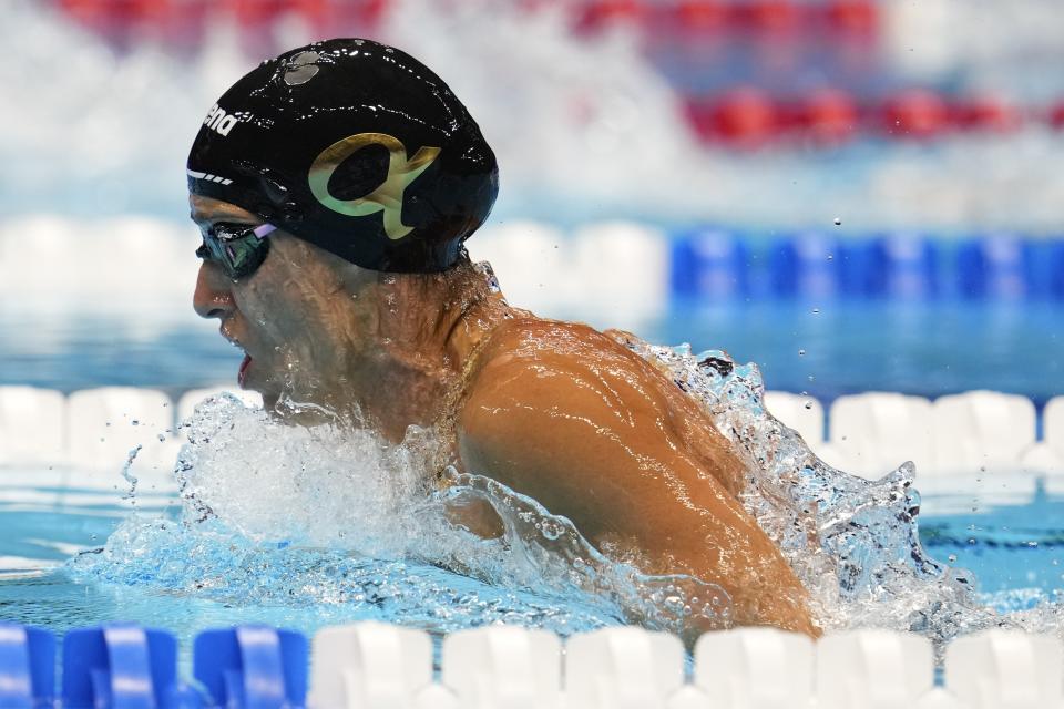 Gabrielle Rose swims during the Women's 100 breaststroke preliminary heat Sunday, June 16, 2024, at the US Swimming Olympic Trials in Indianapolis. (AP Photo/Michael Conroy)