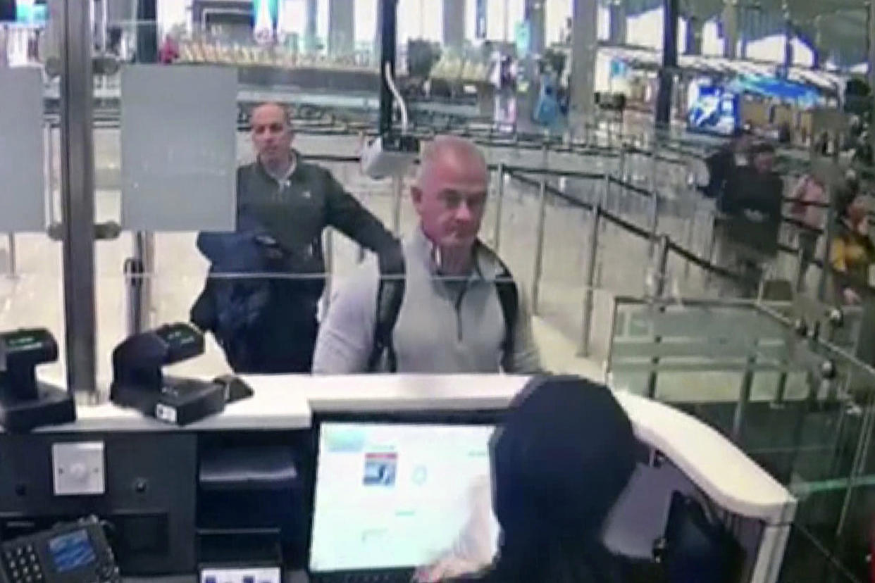 FILE — This Dec. 30, 2019, image from security camera video shows Michael L. Taylor, center, and George-Antoine Zayek at passport control at Istanbul Airport in Turkey. A Tokyo court handed down prison terms for the American father Michael Taylor and son Peter accused of helping Nissan’s former chairman, Carlos Ghosn, escape to Lebanon while awaiting trial in Japan.(DHA via AP, File)