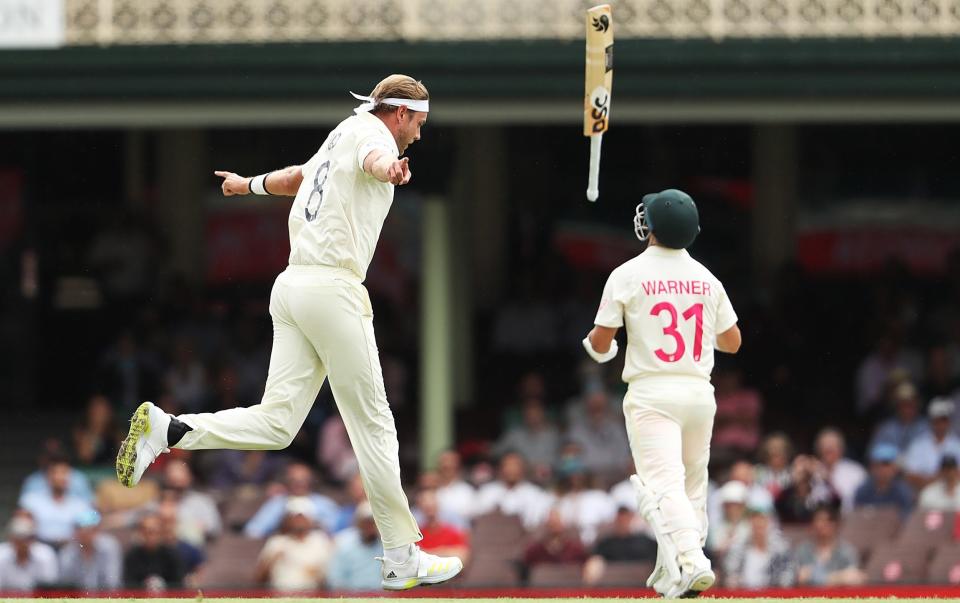 Stuart Broad of England celebrates taking the wicket of David Warner of Australia during day one of the Fourth Test Match in the Ashes series between Australia and England at Sydney Cricket Ground on January 05, 2022 in Sydney - Mark Metcalfe - CA/Cricket Australia via Getty Images