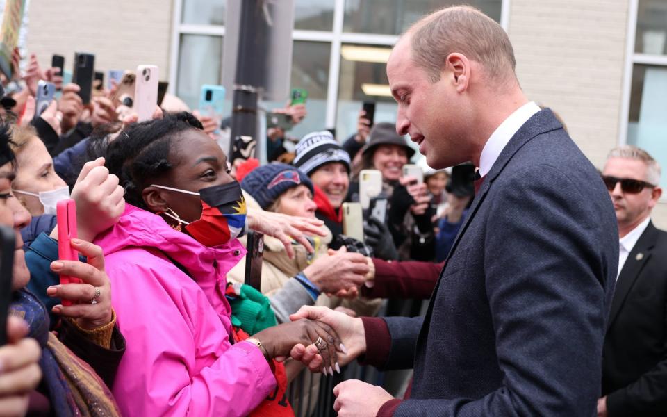 The Prince and Princess of Wales were greeted by large crowds, many of whom waited hours in biting temperatures and torrential downpours - Ian Vogler/Daily Mirror/PA