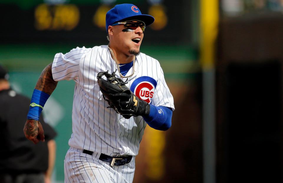 Cubs shortstop Javier Baez pulled off another incredible no-look tag to help seal a Cubs victory. (Photo by Jon Durr/Getty Images)