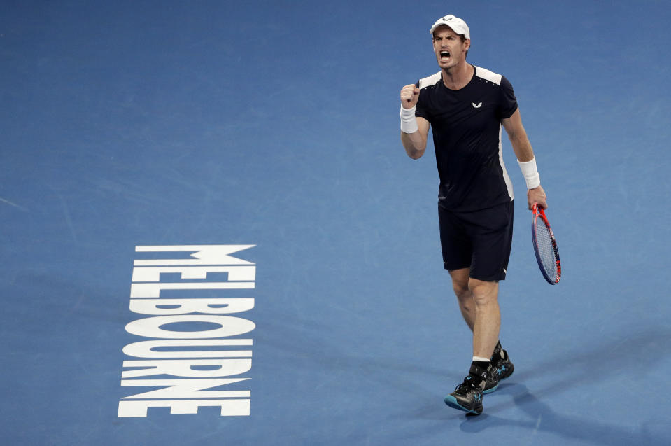 FILE - In this Jan 14, 2019, file photo, Britain's Andy Murray reacts after winning a point against Spain's Roberto Bautista Agut during their first round match at the Australian Open tennis championships in Melbourne, Australia. Five-time Australian Open finalist Murray has been given a wild-card entry into the first Grand Slam tournament of next year. (AP Photo/Mark Schiefelbein, File)