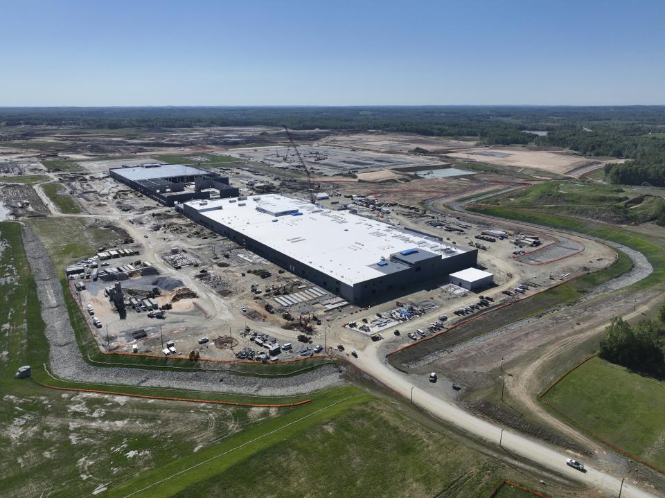 An electric and hybrid vehicle battery factory being built by Toyota is shown while under construction near Greensboro, North Carolina on Monday, May 15, 2023. The plant will supply batteries to Toyota's huge complex in Georgetown, Kentucky, which will build Toyota's first U.S.-made electric vehicle. (Toyota via AP)
