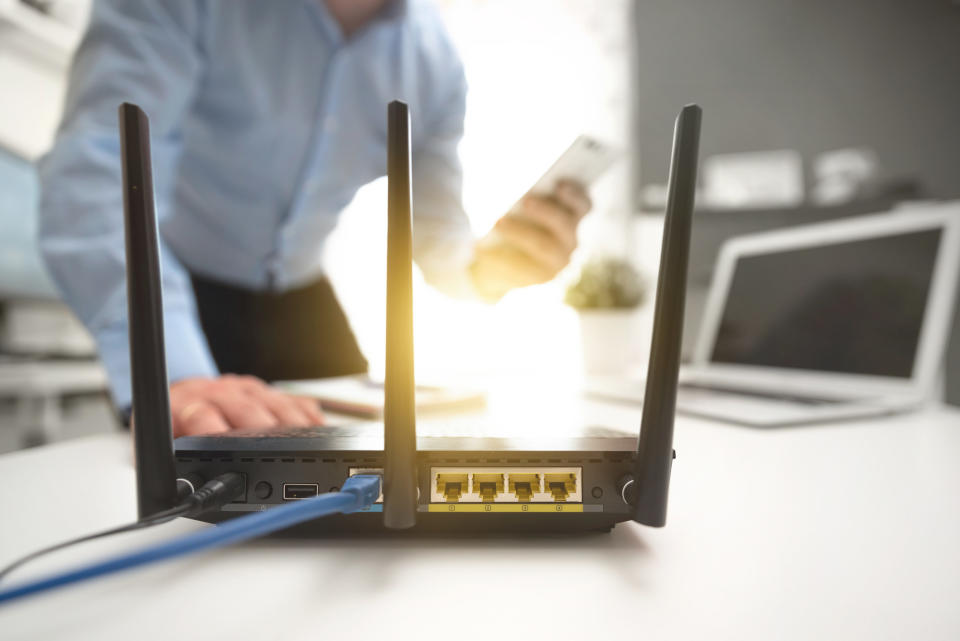 A man setting up a router