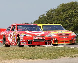 Juan Pablo Montoya and Marcos Ambrose battled for the lead most of the day at Watkins Glen