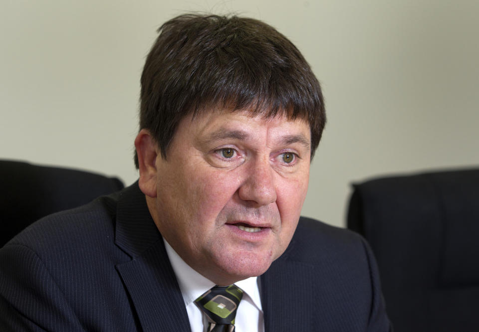 This March 17, 2014, photo, shows New Zealand Privacy Commissioner John Edwards at his office in Wellington, New Zealand. New Zealand's official privacy watchdog has described Facebook as "morally bankrupt" and suggested his country follow neighboring Australia's lead by making laws that could jail executives over streamed violence such as the Christchurch mosque shootings. Edwards comments on Twitter on Monday, April 8, 2019 follow previous criticisms of Facebook's response to a gunman using the platform to livestream some of the slaughter of 50 worshippers. (Mark Mitchell/New Zealand Herald via AP)