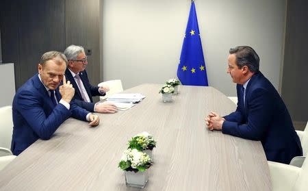 British Prime Minister David Cameron (R) attends a meeting with European Council President Donald Tusk (L) and European Commission President Jean Claude Juncker (C) during a European Union leaders summit addressing the talks about the so-called Brexit and the migrants crisis, in Brussels, Belgium, February 19, 2016. REUTERS/Yves Herman