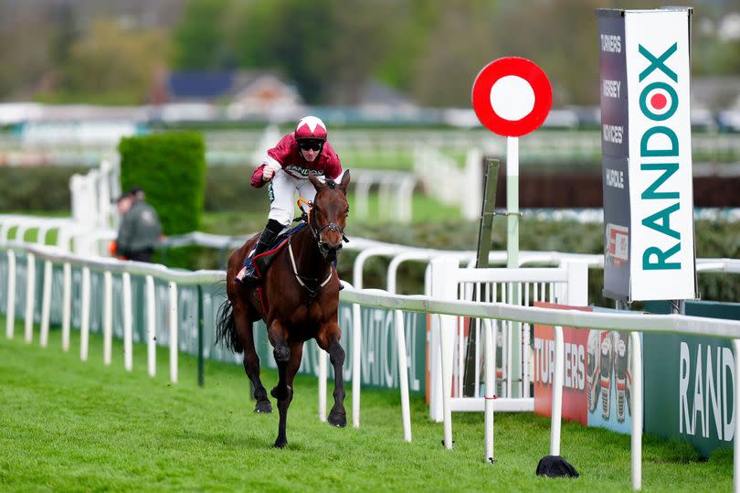 Brighterdaysahead, ridden by Jack Kennedy, on the way to winning the Turners Mersey Novices' Hurdle on day three of the 2024 Randox Grand National Festival at Aintree Racecourse on Saturday, April 13 2024