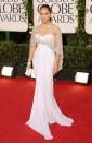 <p>To present at the Golden Globe Awards, Lopez opted for an elegant white gown with a sheer and sparkly shawl. </p>