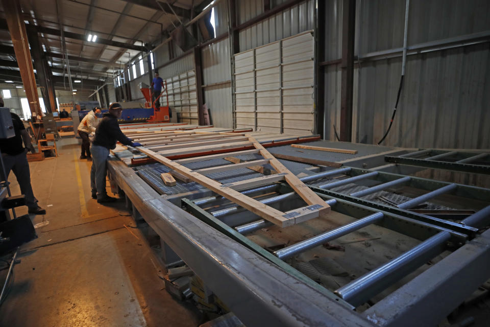 SPANISH FORK, UT - MAY 12: A worker assembles a truss for a home at Wasatch Truss on May 12, 2021 in Spanish Fork, Utah. Lumber prices have sky rocketed along with supply shortages the last several months have plagued the construction industry. (Photo by George Frey/Getty Images)