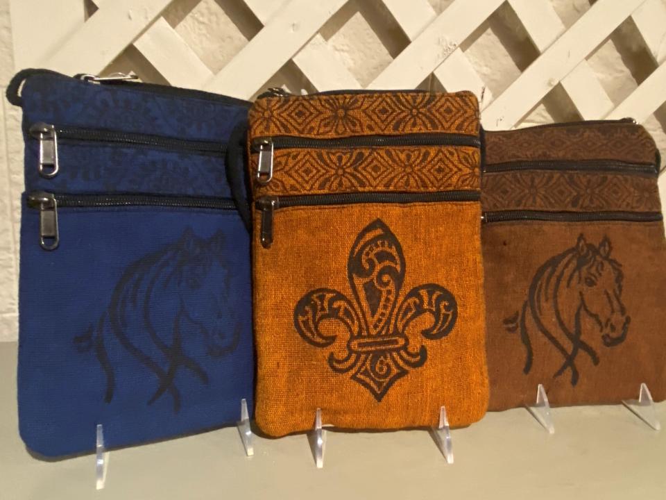 Shoulder bags block printed in Louisville designs handcrafted in Nepal exclusively for Just Creations. $20