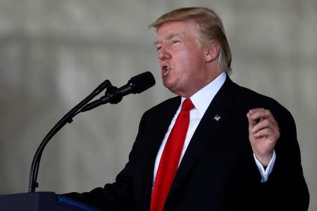 U.S. President Donald Trump participates in the commissioning ceremony of the aircraft carrier USS Gerald R. Ford at Naval Station Norfolk in Norfolk, Virginia, U.S. July 22, 2017. REUTERS/Jonathan Ernst/Files