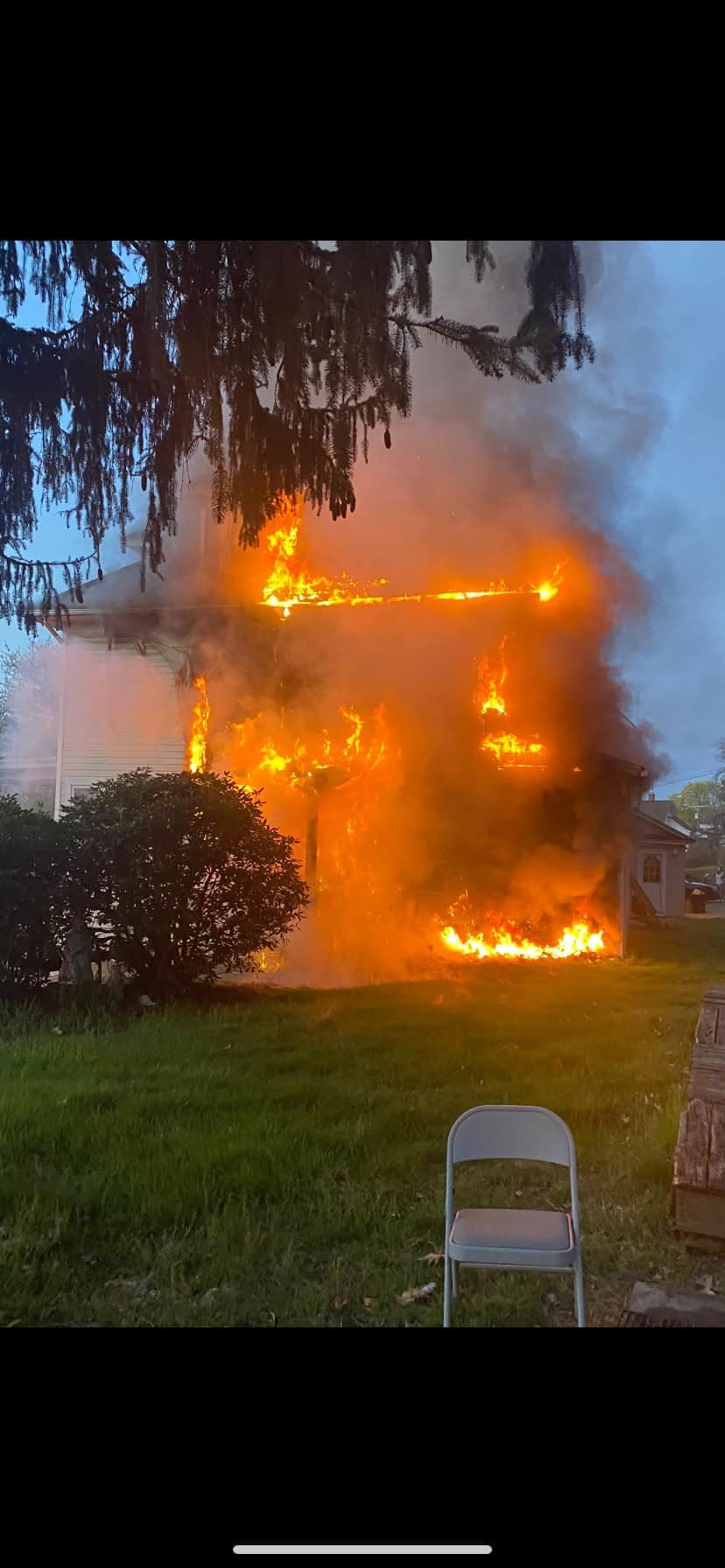 Reponders used a ladder to rescue a man from the second floor of this residential fire Sunday in Rockaway Township.