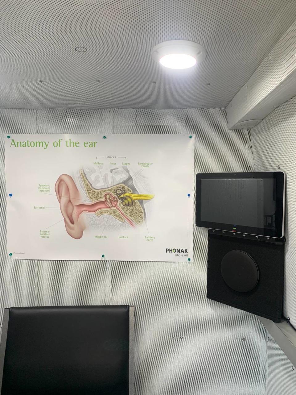 The mobile audiology lab includes a soundproof room for audiometry, where the extent of a youth’s hearing loss is measured.